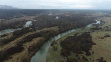 Areal shot of river an fields